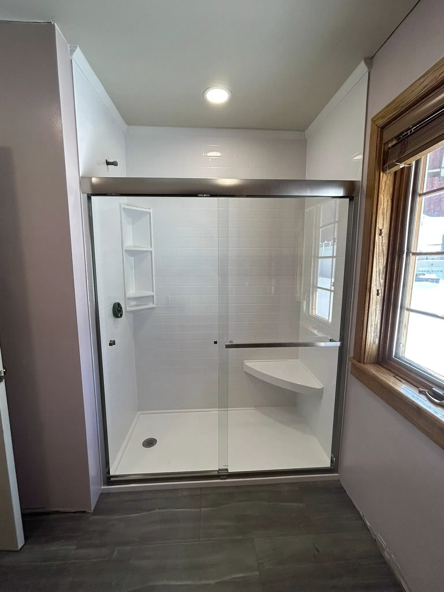 Excellence in Baths craftsmanship detail on a completed shower remodel